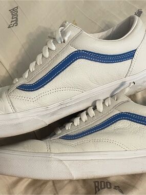 Vans White Leather Old Skool Sneakers with Blue Stripe